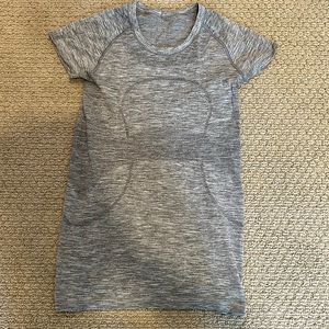 Grey lightly worn Lululemon Swiftly Tech Short-Sleeve Shirt.